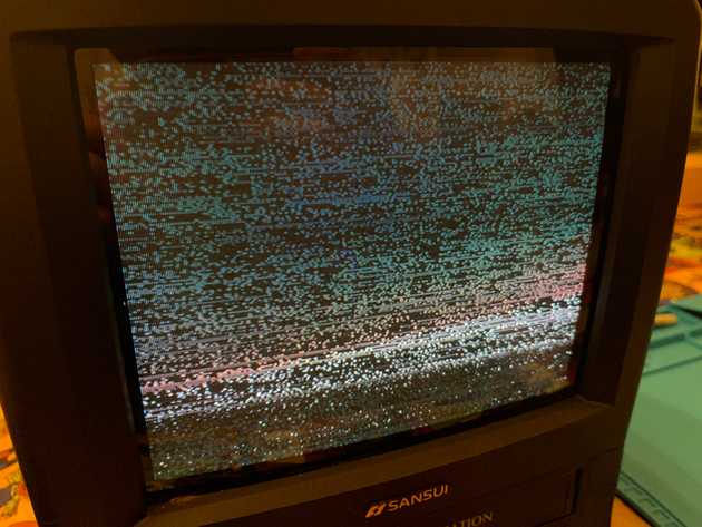 The TV unit playing a video with static