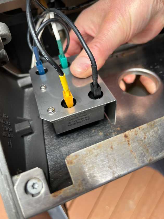 Wiring electrodes to the new button